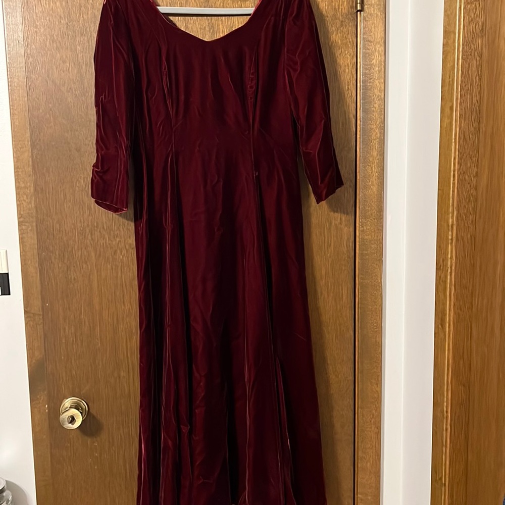 Dark burgundy/red dress.